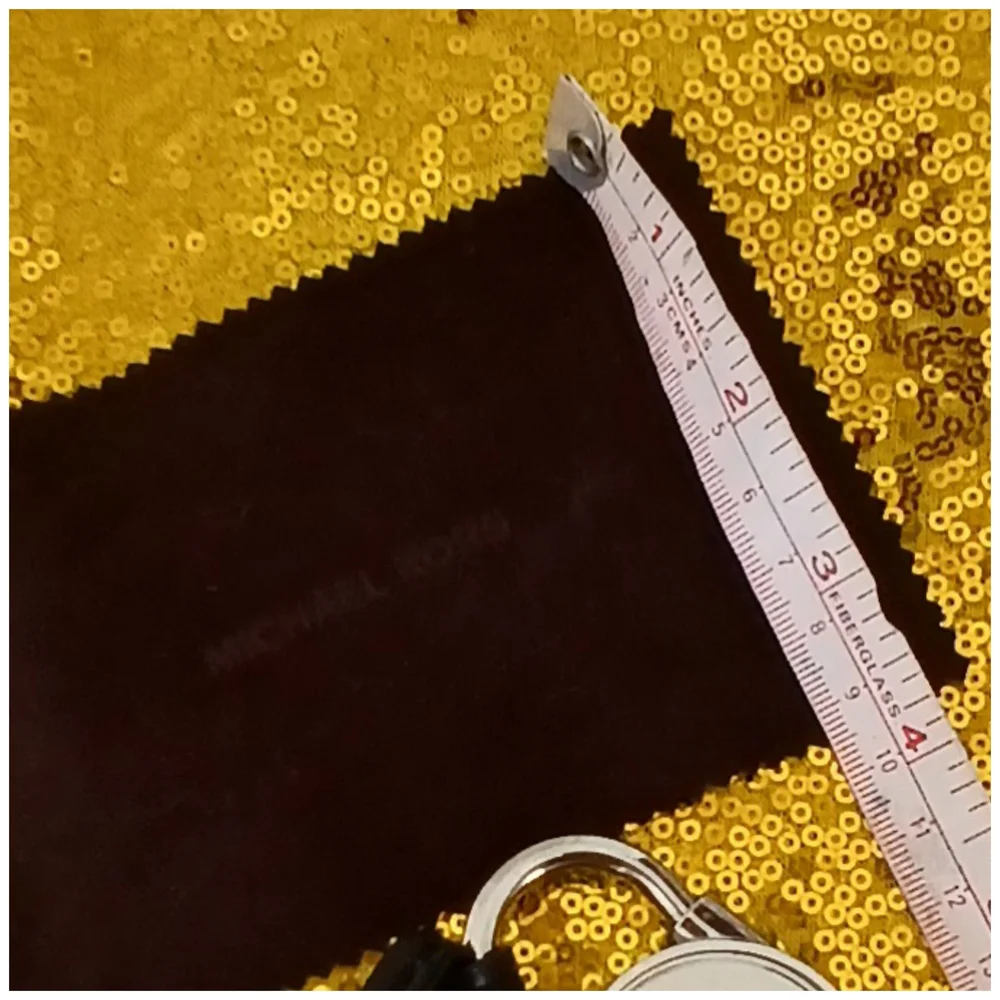 Michael Kors Black and Silver Key Holder And A Clothe Cleaner